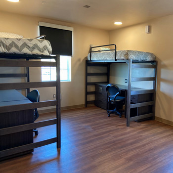 Residence Hall room with bed and closet