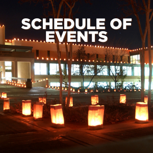 A group of musicians playing instruments outdoors, with a banner reading “SCHEDULE OF EVENTS” overhead.